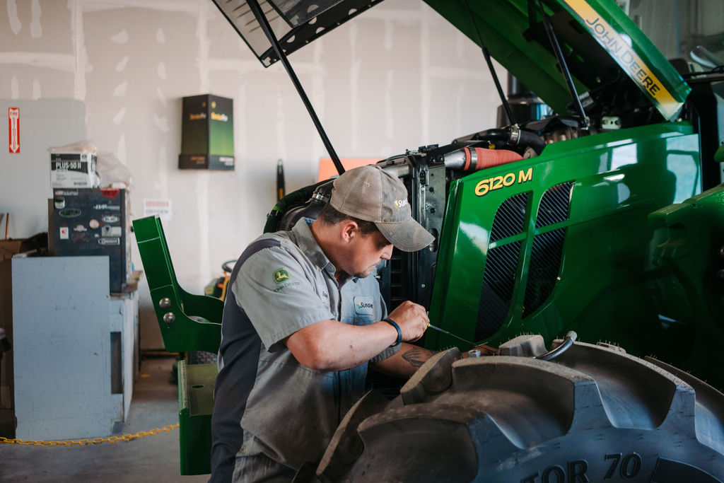 Sunshine Quality Solutions John Deere service technician in Louisiana